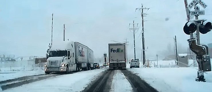 Train cuts FedEx Truck