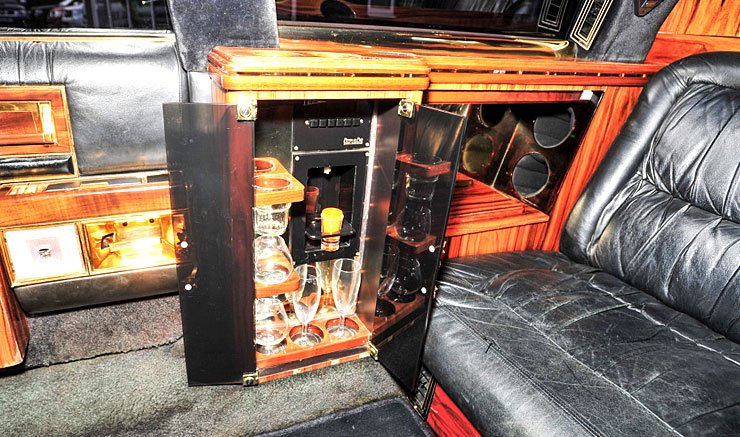 trump-1988-cadillac-cabinet-with-glasses