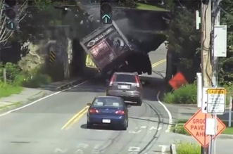 careless truck driver hits infamous low bridge in Massachusetts