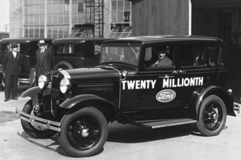 Henry Ford seating in Ford Model A