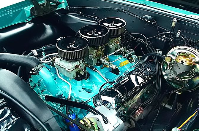 Pontiac 389ci V-8 with trio of Rochester carburetors