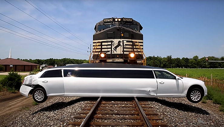 Stretch limo hit by train