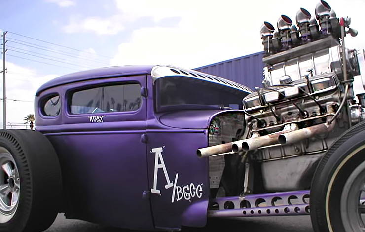 The Blown Pontiac with its 8 carbs in Purple People Eater hot rod