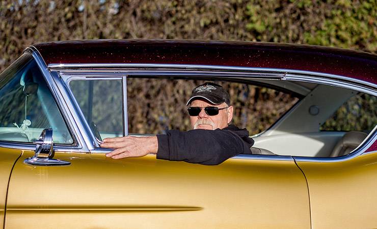 Fred Bottcher in his golden 1957 Cadillac hot rod