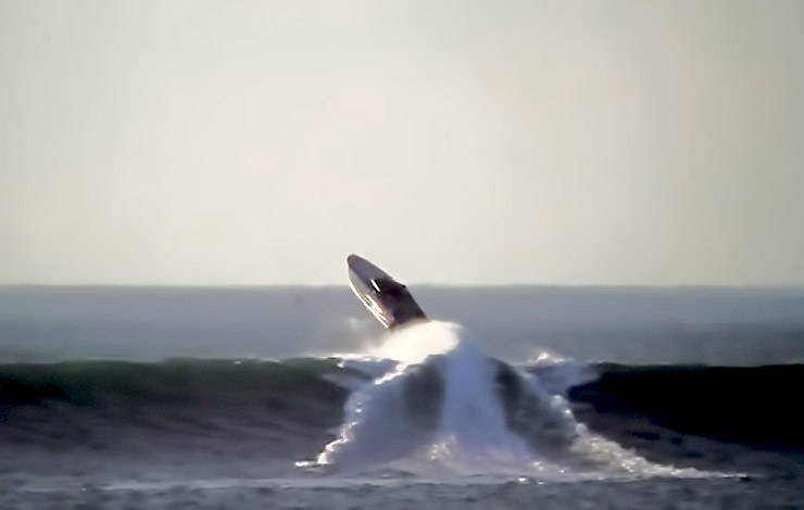 A huge wave sends Donzi powerboat it flying 40ft into the air