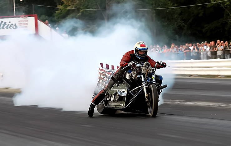 Drag racing motorcycle powered by alcohol-burning blown V8 Chevy engine