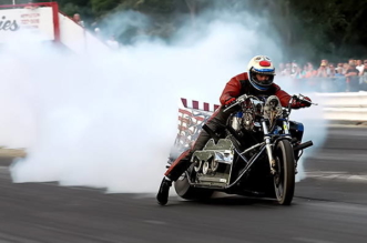 Mike Charlton riding Drag Bike with blown V8 Chevy engine